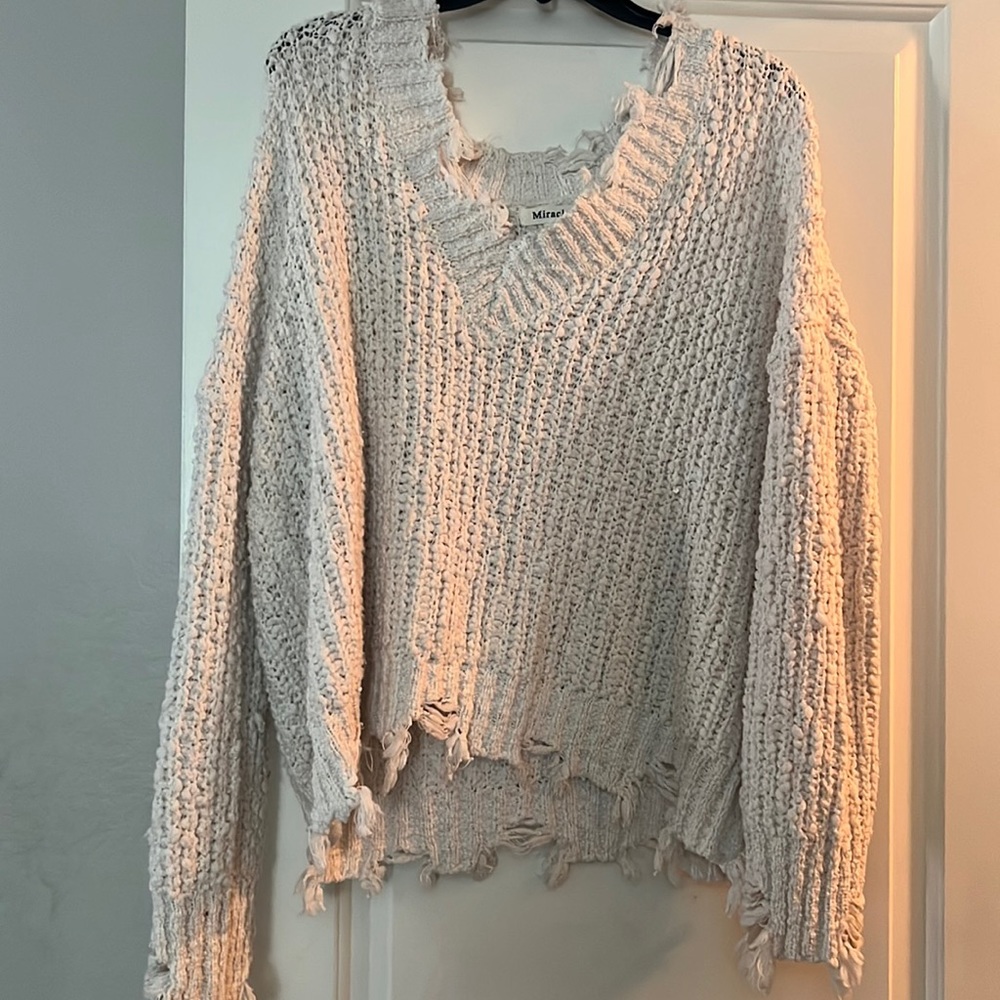 Over sized distressed sweater